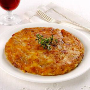 Piatto con sopra del formaggio Frico Friuli